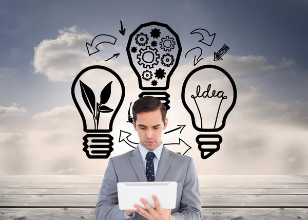 Businessman holding a tablet computer — Stock Photo, Image