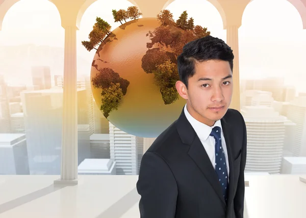 Image composite de sérieux homme d'affaires asiatique — Photo