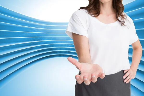 Attractive businesswoman showing her empty hand open — Stock Photo, Image