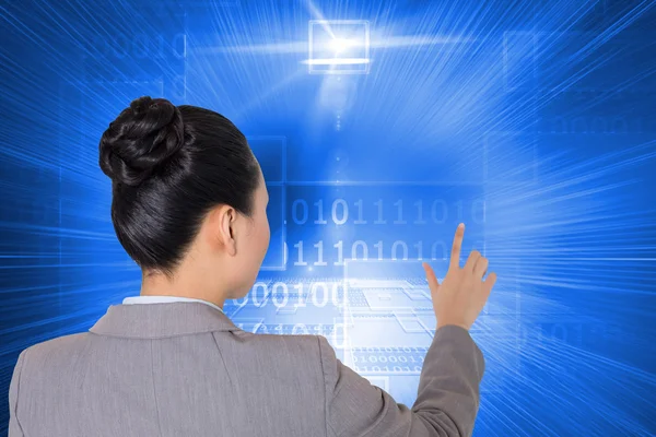 Composite image of asian businesswoman pointing — Stock Photo, Image