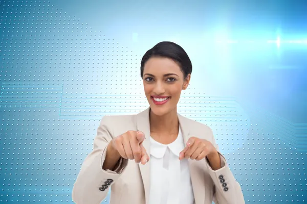 Businesswoman pointing at the camera — Stock Photo, Image