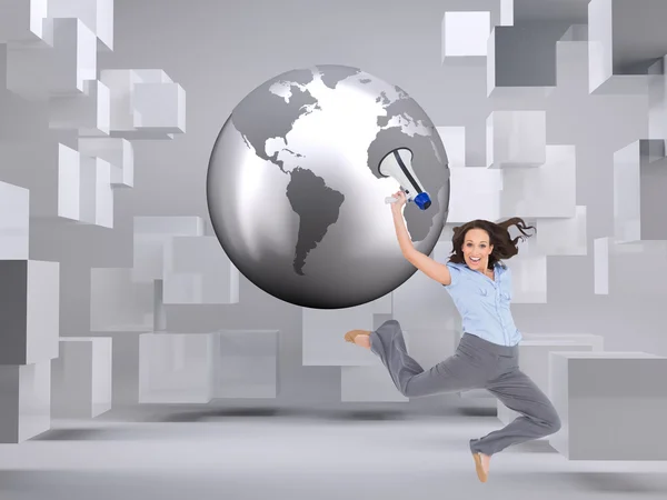 Cheerful classy businesswoman jumping while holding megaphone — Stock Photo, Image