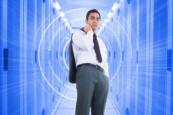 Composite image of unsmiling businessman standing — Stock Photo, Image