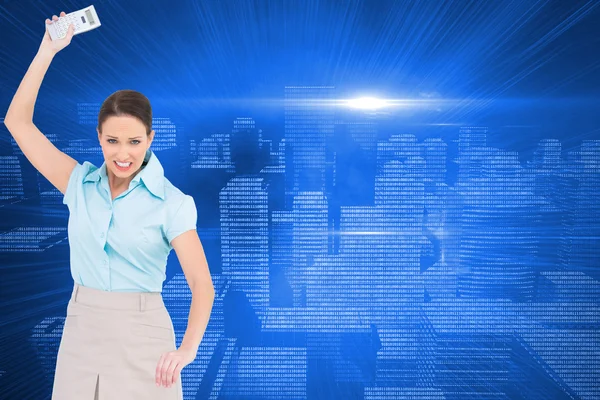 Furious classy businesswoman throwing her calculator — Stock Photo, Image