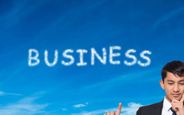 Composite image of thoughtful businessman holding — Stock Photo, Image