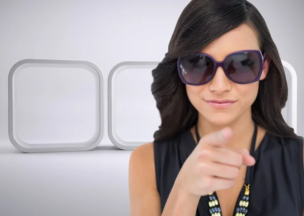 Elegant brunette pointing at camera — Stock Photo, Image