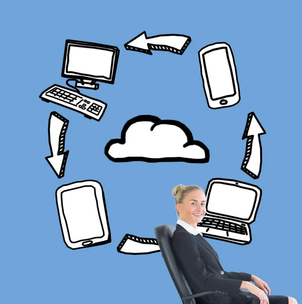 Businesswoman sitting in swivel chair in front of illustrations — Stock Photo, Image
