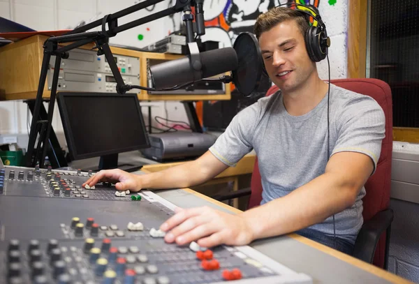 Handsome happy radio host moderating — Stock Photo, Image