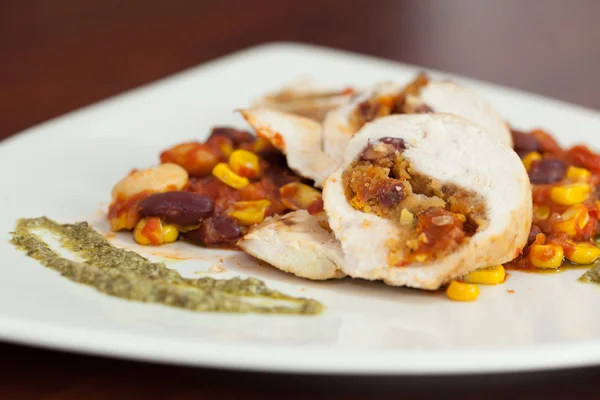 Close up of chicken dish with salsa — Stock Photo, Image