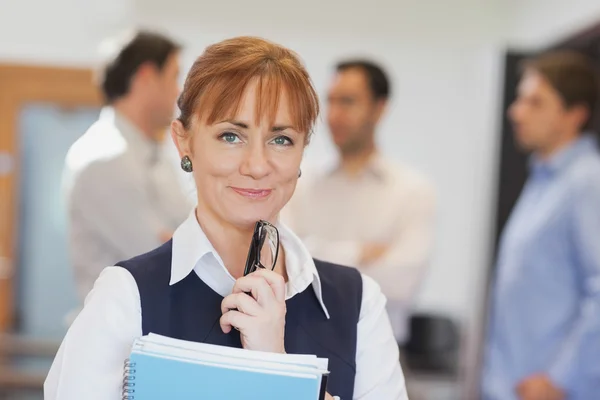 Lovely female mature student posing in classroom — Stock Photo, Image