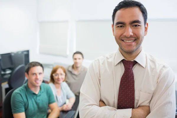 Teacher with mature students in computer room — Stock Photo, Image