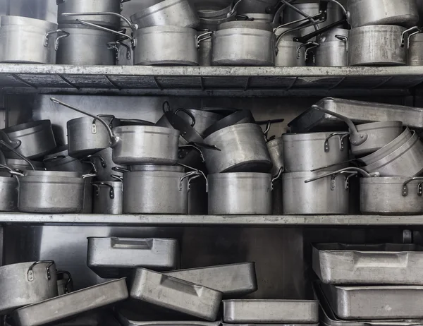 Shelf full of pans — Stock Photo, Image