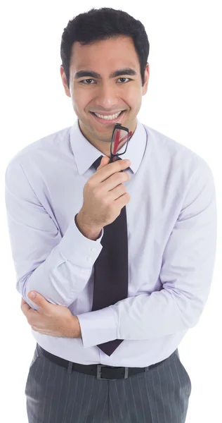 Smiling businessman holding glasses — Stock Photo, Image