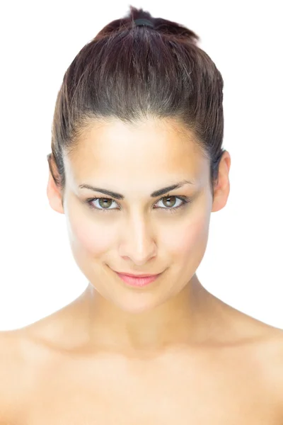 Front view of gorgeous woman smiling self confidently at camera — Stock Photo, Image