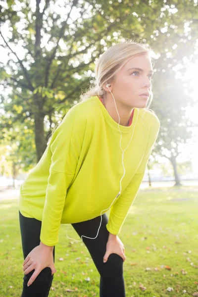 Active serious blonde catching her breath — Stock Photo, Image