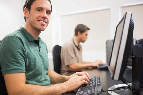Mature students in computer room — Stock Photo, Image