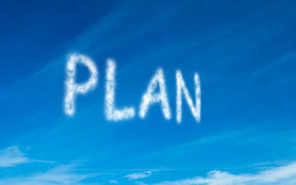 Plan in weiß in den Himmel geschrieben — Stockfoto