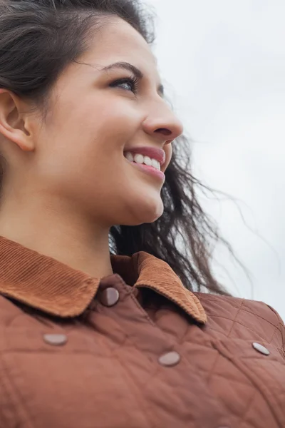 Close up of cute smiling woman in stylish brown jacket — Stock Photo, Image