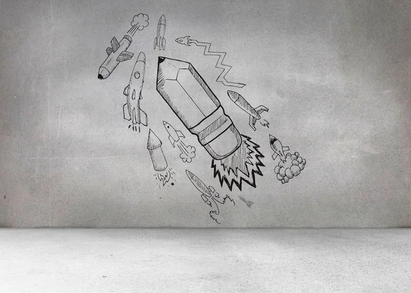 Kalem roket ile gri duvar — Stok fotoğraf