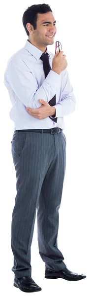 Smiling businessman holding glasses — Stock Photo, Image