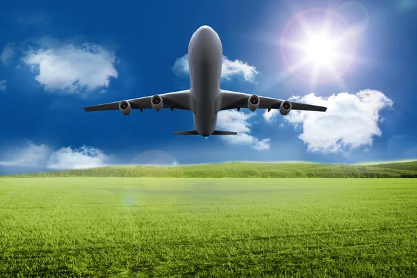 3D plane taking off over grassland — Stock Photo, Image