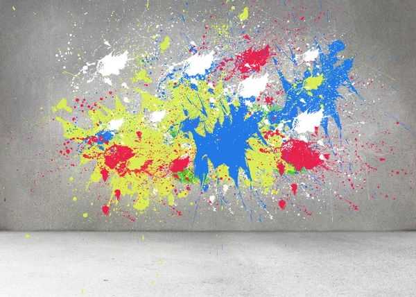 Splashes of color on grey wall — Stock Photo, Image