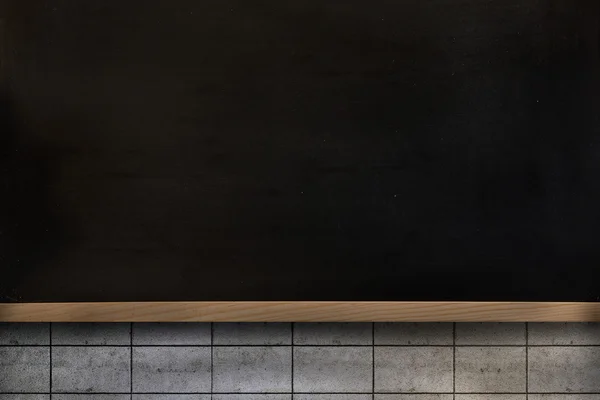 Blackboard on wall — Stock Photo, Image