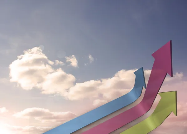 Colourful curved arrows pointing up against sky — Stock Photo, Image