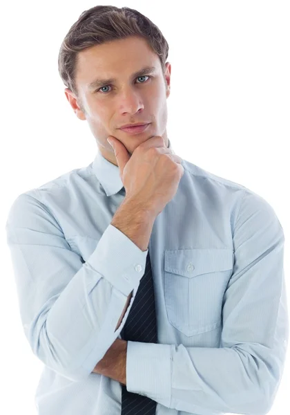 Denkender Geschäftsmann mit der Hand am Kinn — Stockfoto