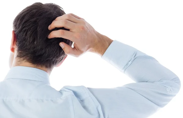 Businessman scratching his head — Stock Photo, Image