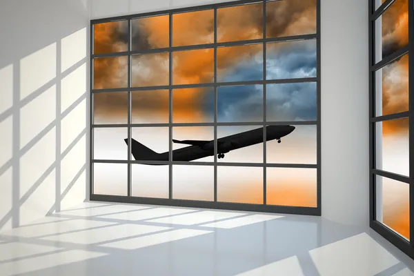 Uçak uçan üzerinde orange sky pencere — Stok fotoğraf