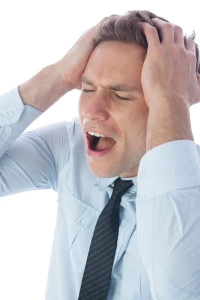 Hombre de negocios estresado con las manos en la cabeza —  Fotos de Stock