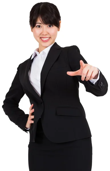 Lächelnde Geschäftsfrau zeigt — Stockfoto