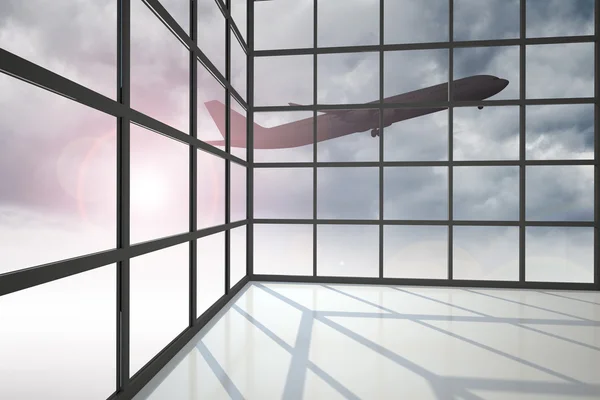 Avión volando sobre nubes pasando la ventana — Foto de Stock