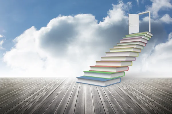 Book steps leading to door against sky — Stock Photo, Image