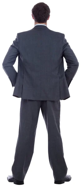 Businessman standing with hands on hips — Stock Photo, Image