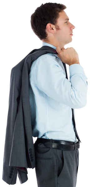 Hombre de negocios serio sosteniendo su chaqueta —  Fotos de Stock