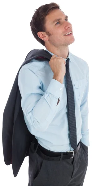 Smiling businessman holding his jacket — Stock Photo, Image