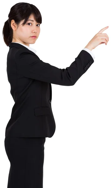 Focused businesswoman pointing — Stock Photo, Image