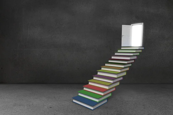 Steps made from books leading to door in grey room — Stock Photo, Image