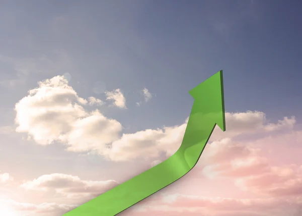 Green arrow pointing up against sky — Stock Photo, Image