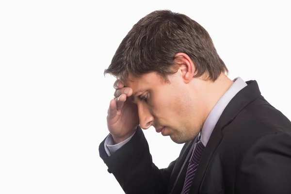 Close-up side view of a worried businessman — Stock Photo, Image