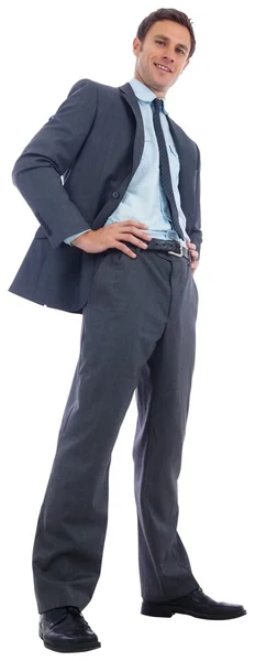 Happy businessman with hands on hips — Stock Photo, Image