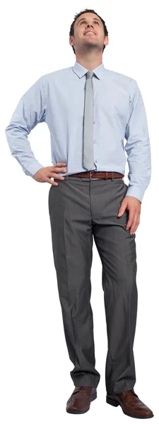 Smiling businessman with hand on hip — Stock Photo, Image