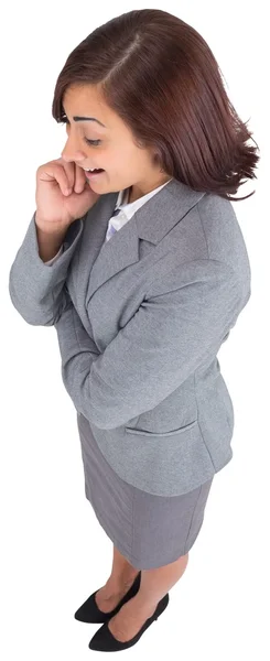 Smiling thoughtful businesswoman Stock Picture