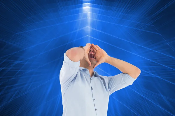 Composite image of shouting casual man standing — Stock Photo, Image