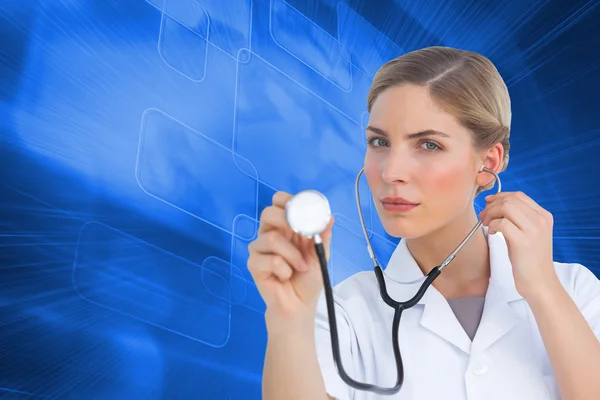 Nurse listening with stethoscope — Stock Photo, Image