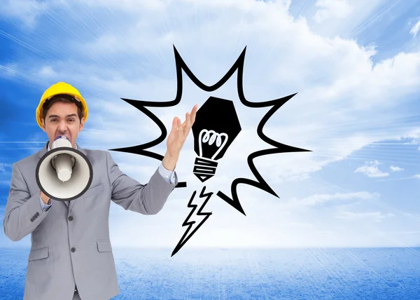 Architect with hard hat shouting with a megaphone — Stock Photo, Image