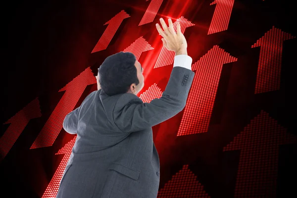 Composite image of businessman with arms raised — Stock Photo, Image