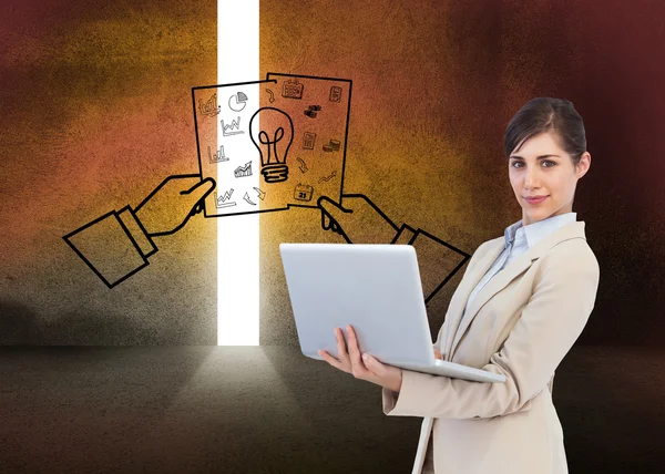 Composite image of confident young businesswoman with laptop — Stock Photo, Image